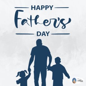 Silhouette of a father holding hands with two children beneath the words 'Happy Father's Day' in a blue design.